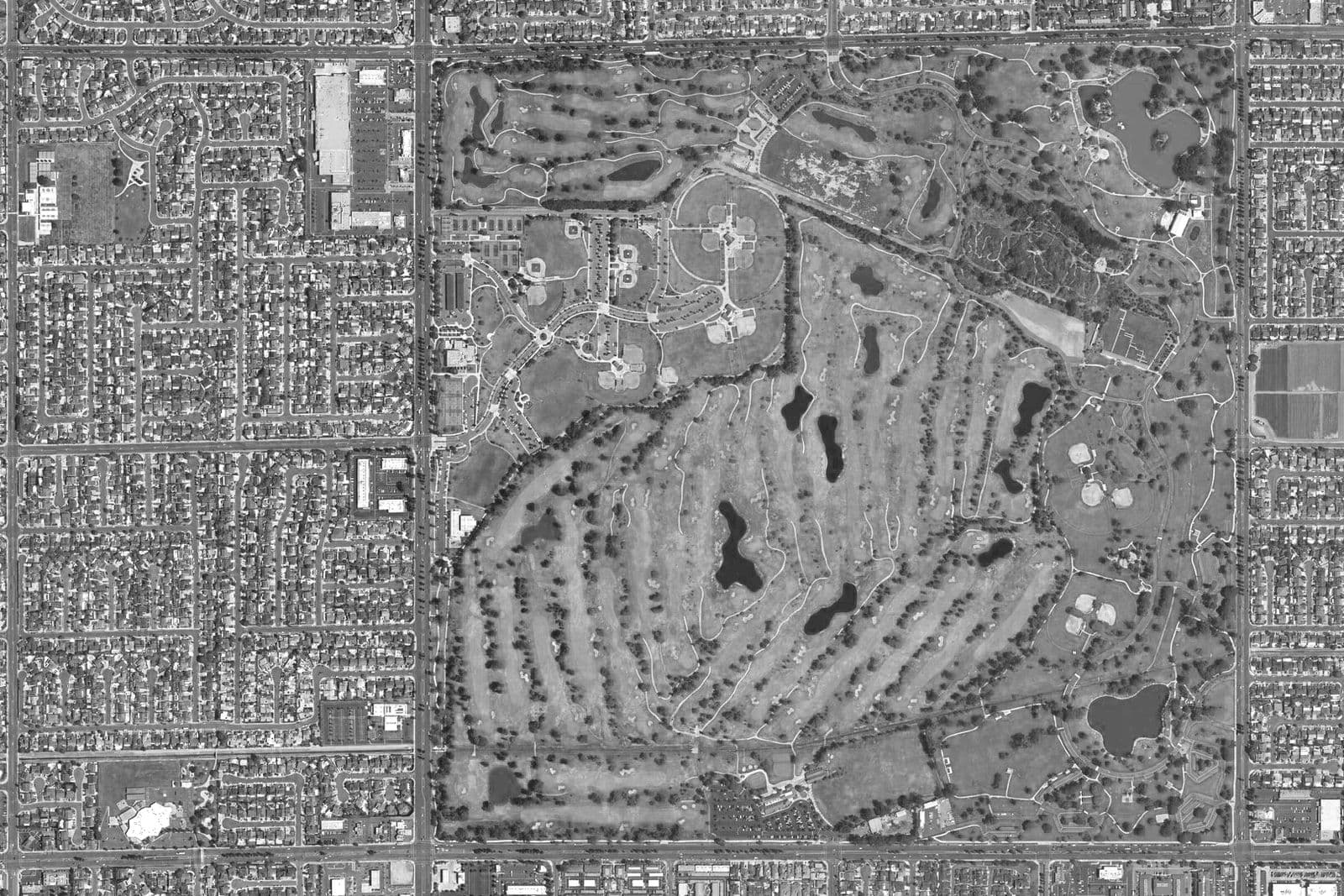 Mile Square Regional Park from the air, a mile of golf course, lakes and ball fields held inside the Fountain Valley street grid